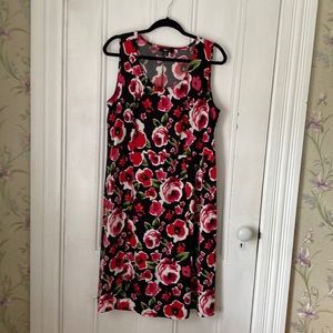 Polyester dress. Black with red roses.